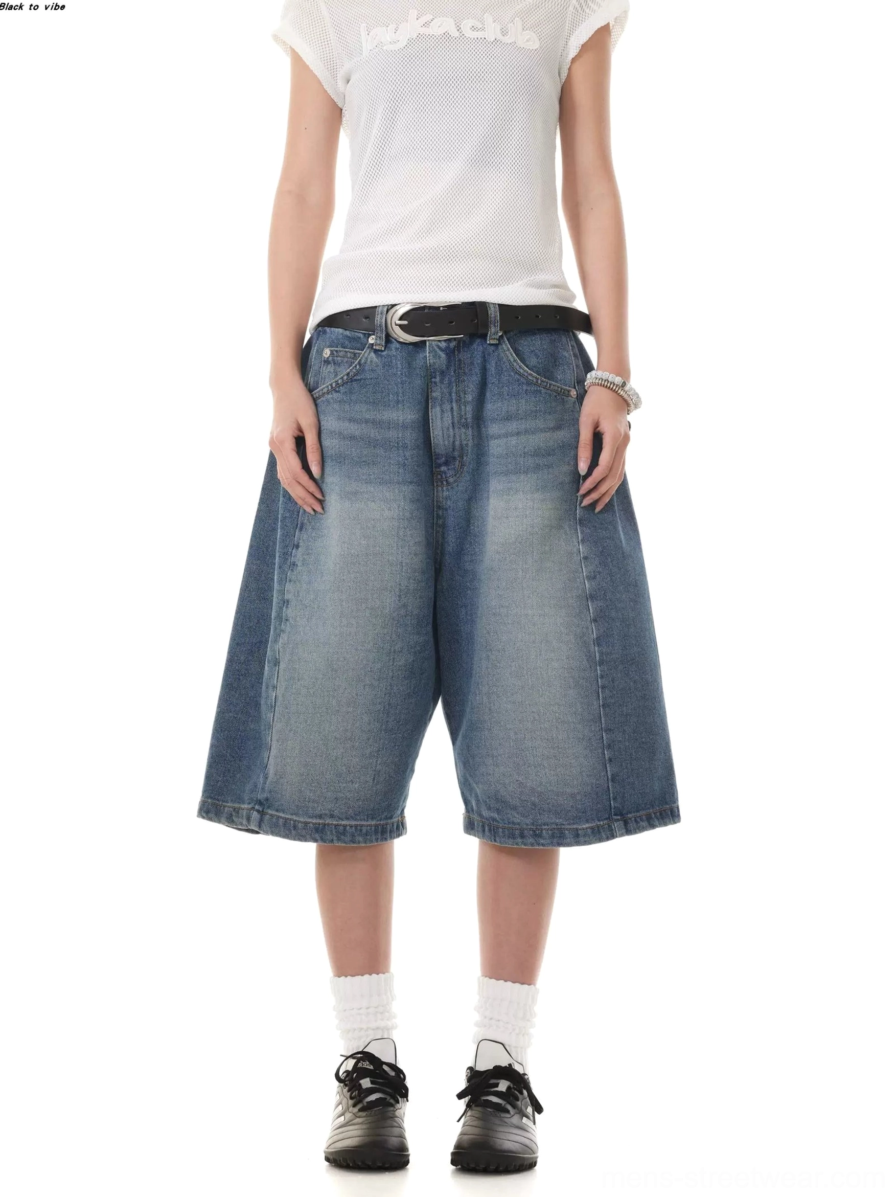 Vintage wash blue wide-leg denim Bermuda shorts in a right front three-quarter view for Korean streetwear styling