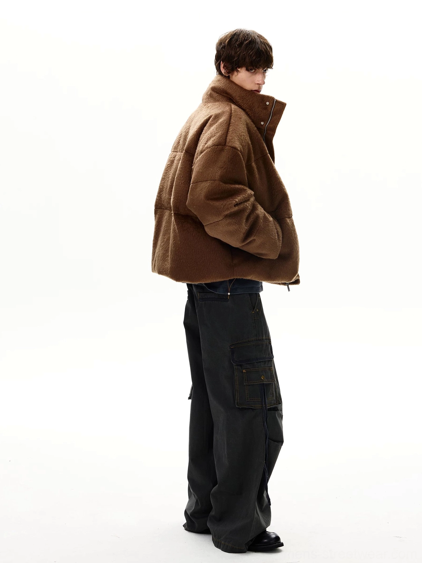 Dark gray baggy strap cargo jeans rear side view showing wide draped legs, back pockets, and long side drawcords