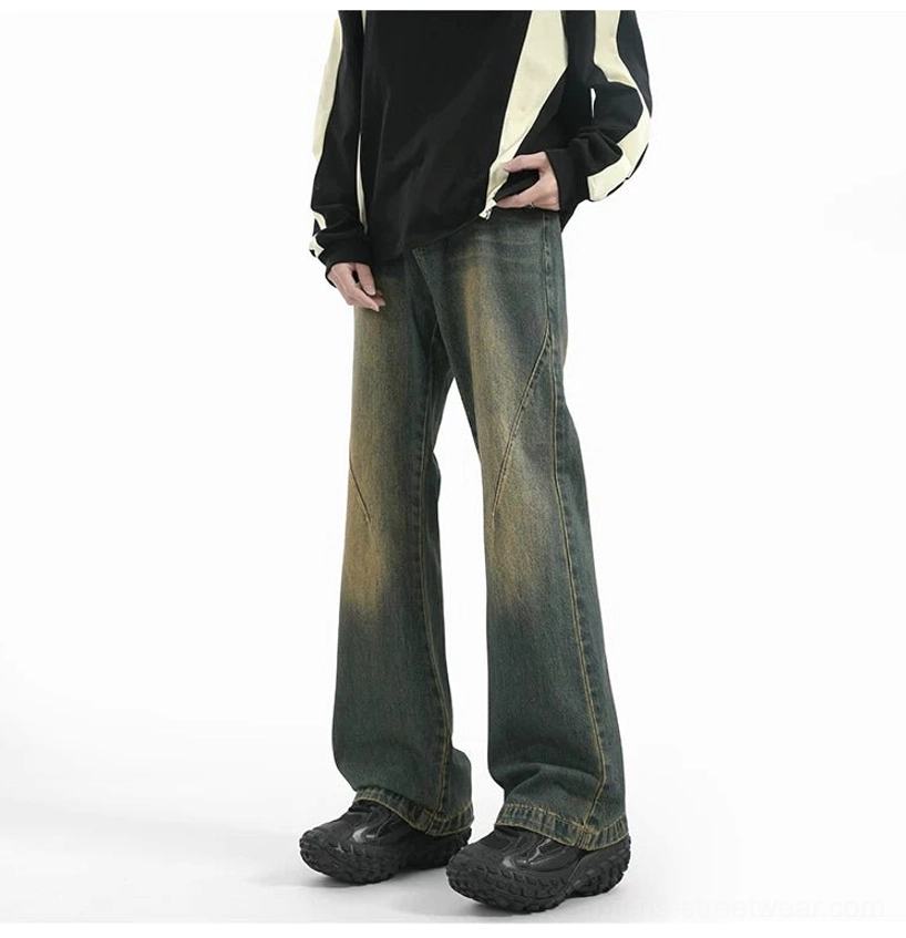 Right side view of vintage washed arc flare jeans with raw denim hem, relaxed fit, and stacked streetwear proportions