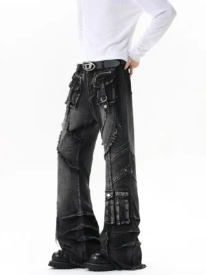 Rear three-quarter view of faded black multi-pocket flared cargo jeans with frayed seams, utility pockets, metal hardware, and stacked boot fit