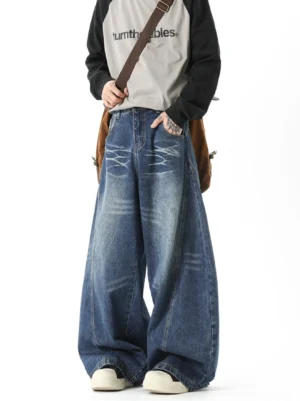 Vintage washed blue ripple wash ultra wide barrel jeans front view with whisker fading and full length Korean streetwear fit