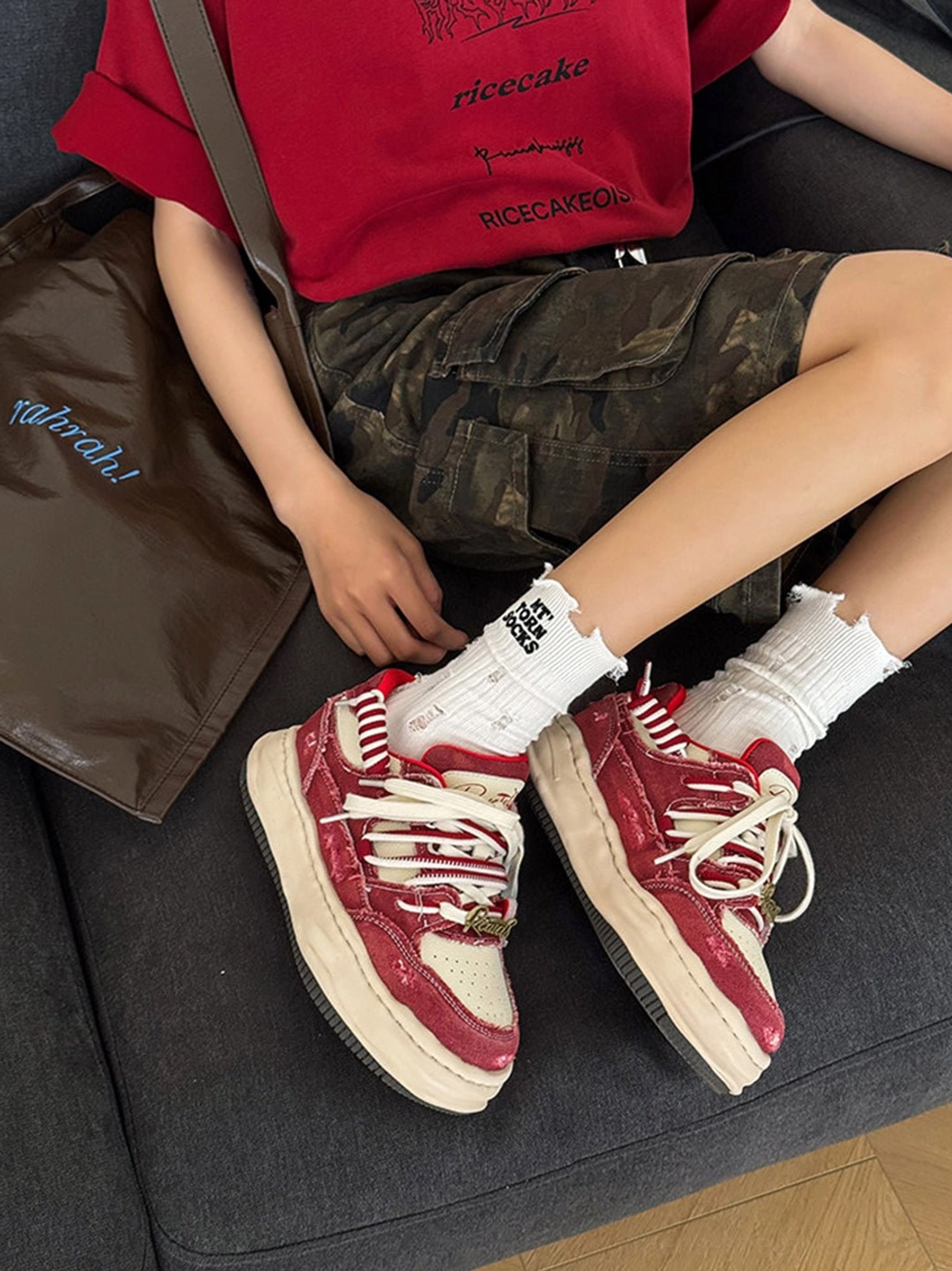 Vintage washed denim platform sneakers styled for a bold retro streetwear outfit with oversized proportions and chunky sole