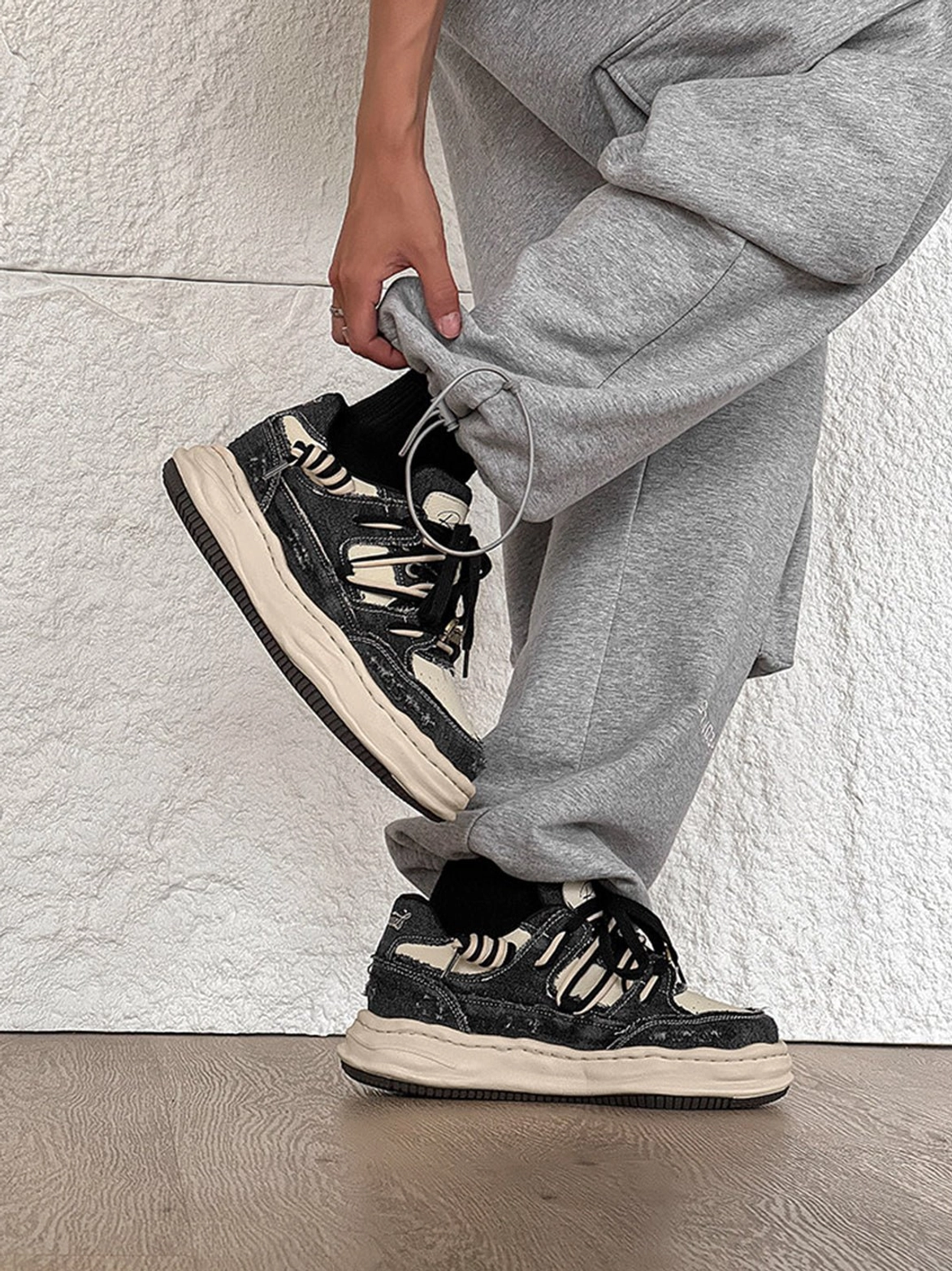 Vintage washed denim sneakers featuring a chunky sole and expressive silhouette for Y2K casual fashion outfits