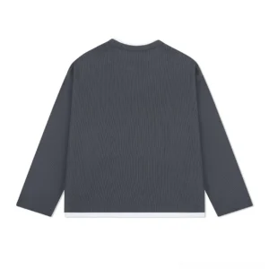 Dark gray waffle knit layered long sleeve tee shown from the back with clean relaxed fit and white underlayer hem