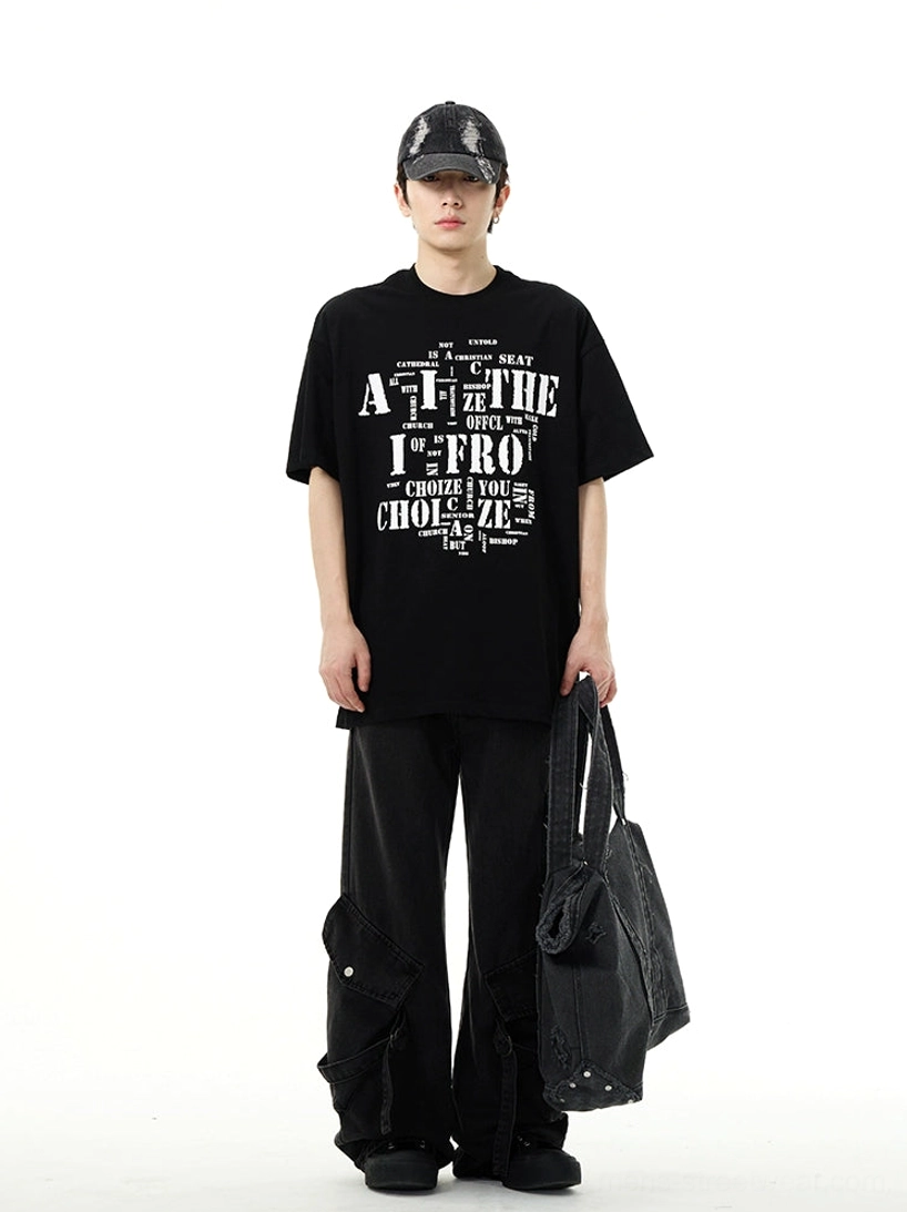 Full-body streetwear outfit featuring washed black cargo wide-leg denim jeans with graphic tee cap and tote bag
