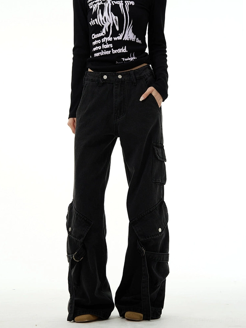 Washed black high-waist cargo wide-leg denim jeans styled on female model with fitted black top and loafers