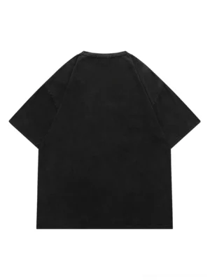 Washed black face art oversized graphic tee back flat lay showing clean solid vintage wash back drop shoulder sleeves and crew neck