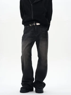 Front full-body view of washed black straight loose jeans with faded denim texture and classic five-pocket streetwear design