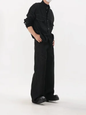 Side view of washed black utility denim jacket and relaxed wide leg pants Korean streetwear outfit