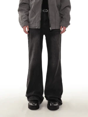 Front view of men's washed black flared denim jeans with five-pocket construction, belt loops, and wide leg streetwear silhouette