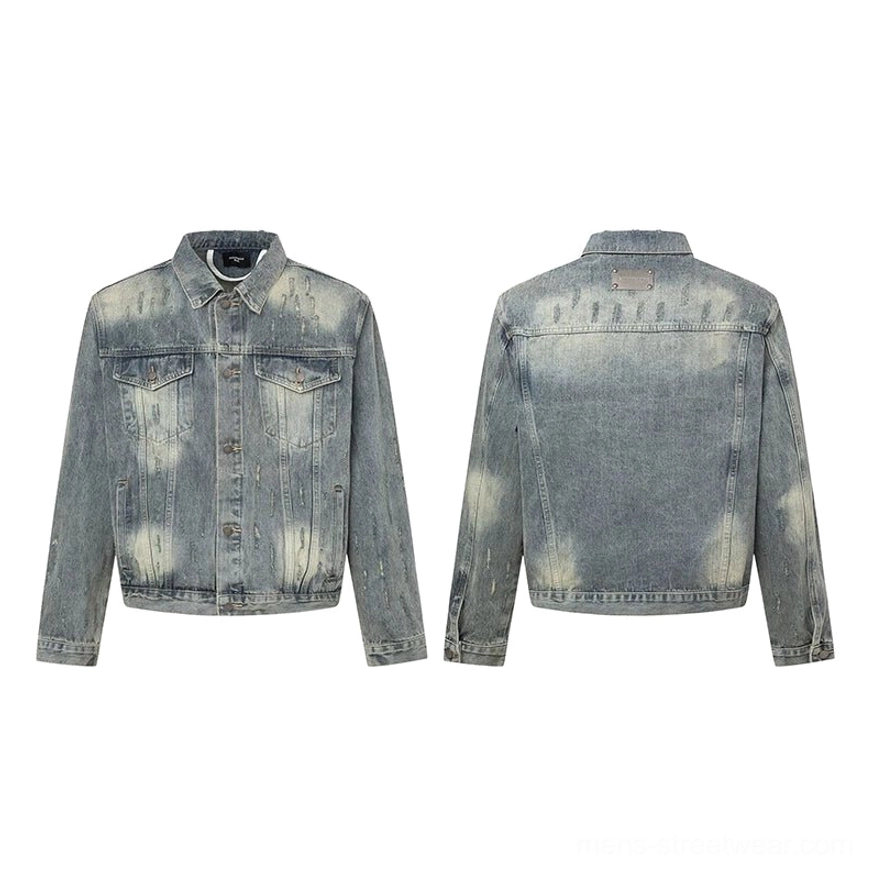 Flat lay of washed blue denim shoulder pad jacket showing front and back button placket chest pockets collar and faded acid wash