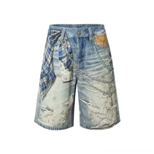 Front flat lay of washed blue plaid chain detail distressed denim jorts with wide leg fit, ripped texture and streetwear styling
