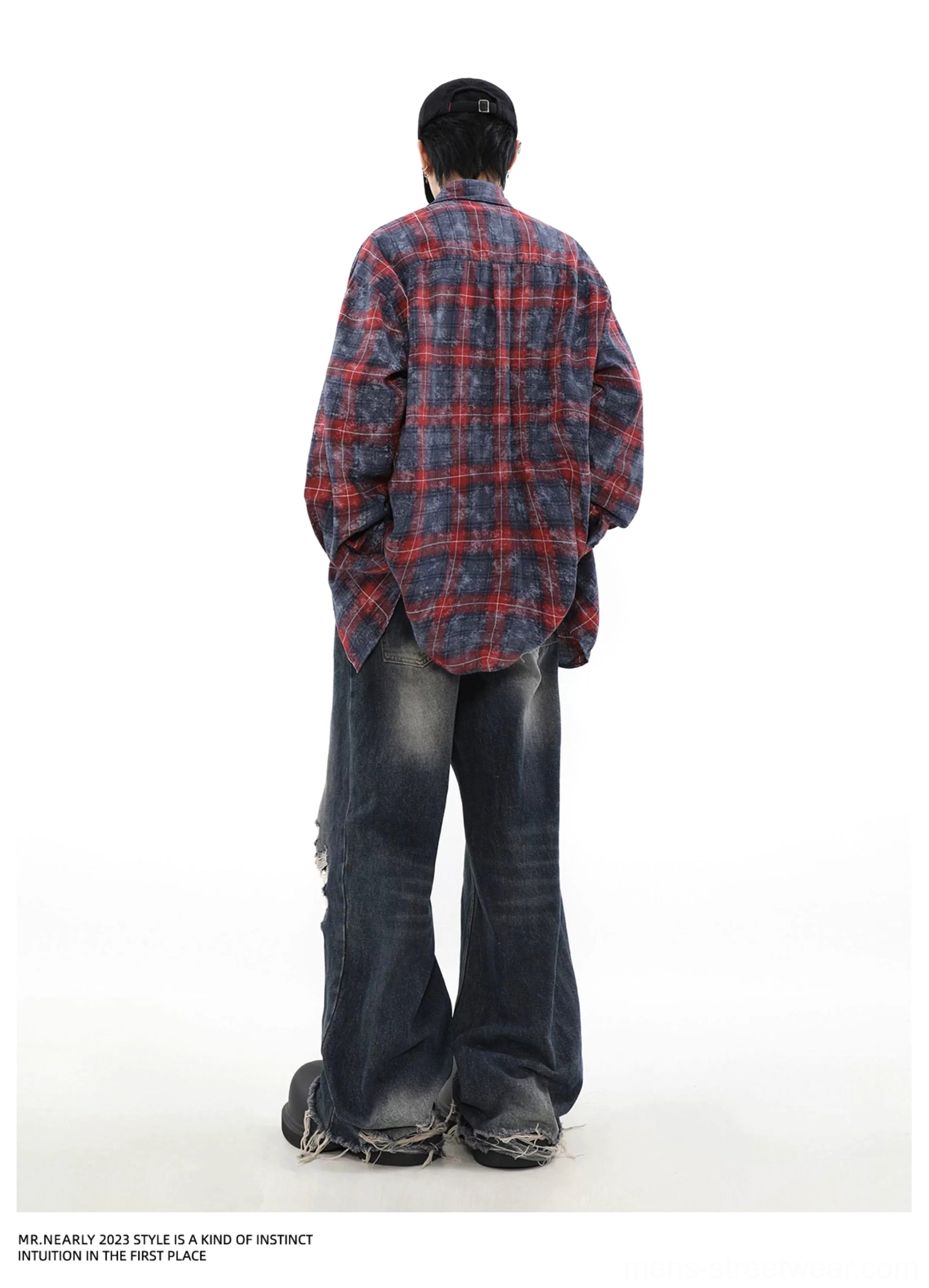 Washed blue plaid overshirt product image highlighting the oversized streetwear silhouette and vintage faded check pattern