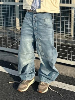Brown retro trail runner sneakers styled with baggy light wash denim for a relaxed Korean streetwear outfit