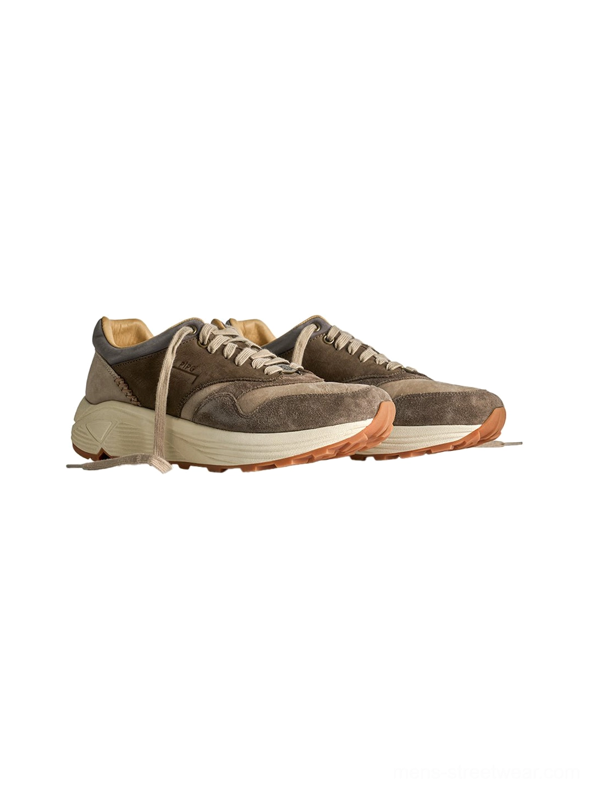 Coffee brown retro trail runner sneakers designed with tonal panels, padded heel support, and lugged outsole