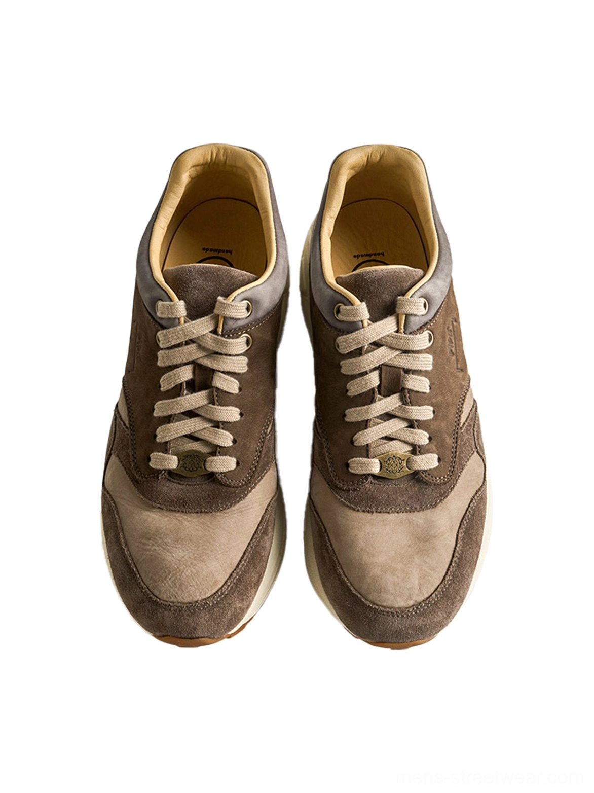 Pair of brown retro trail runner sneakers featuring tonal suede color blocking and classic lace-up styling