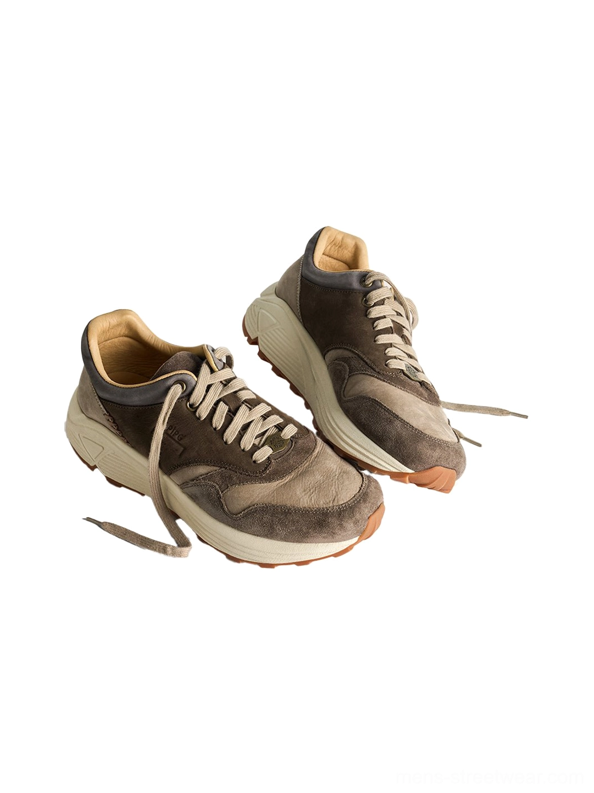 Washed brown retro trail runner sneakers with layered suede panels and a chunky molded sole