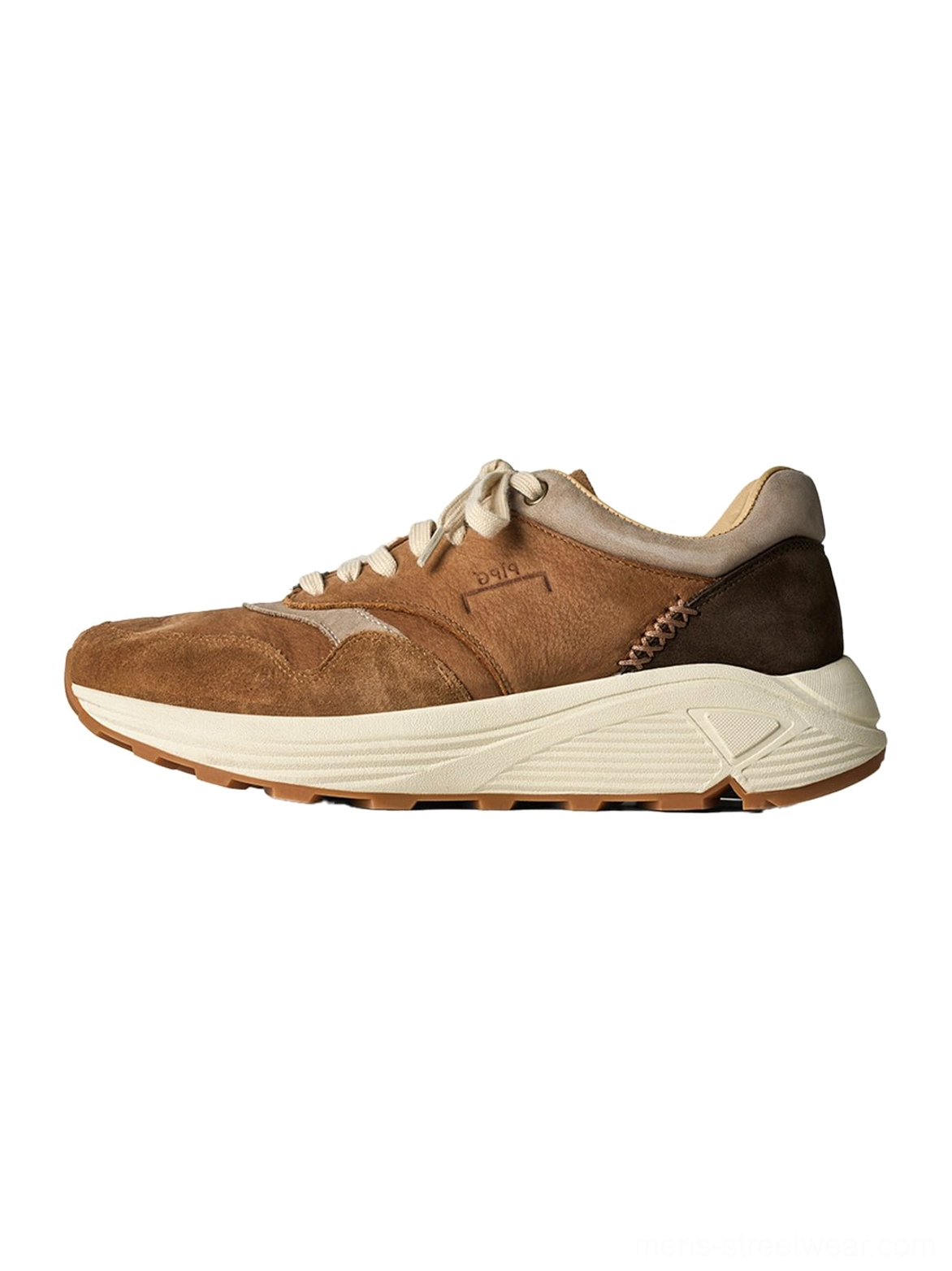 Brown retro trail runner sneakers showcasing a rounded toe, suede upper, and thick casual rubber sole
