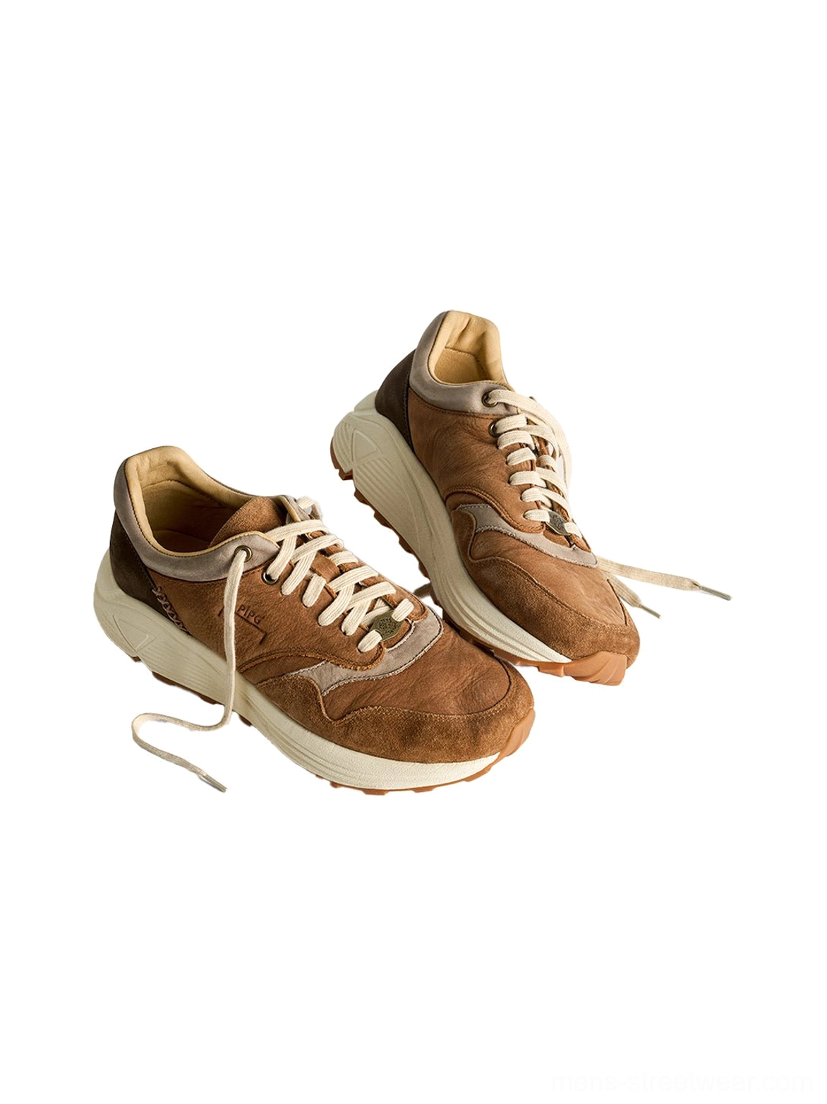 Unisex washed brown trail runner sneakers with classic lace-up construction and a rounded low-top toe