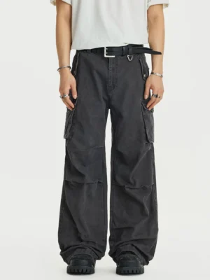 Washed charcoal stacked cargo wide leg pants front view styled with white t-shirt belt and chunky work boots
