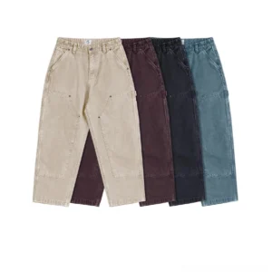 Relaxed carpenter denim pants in multiple muted color options shown in a front flat lay with utility pockets, reinforced knee panels, and a baggy Korean streetwear fit