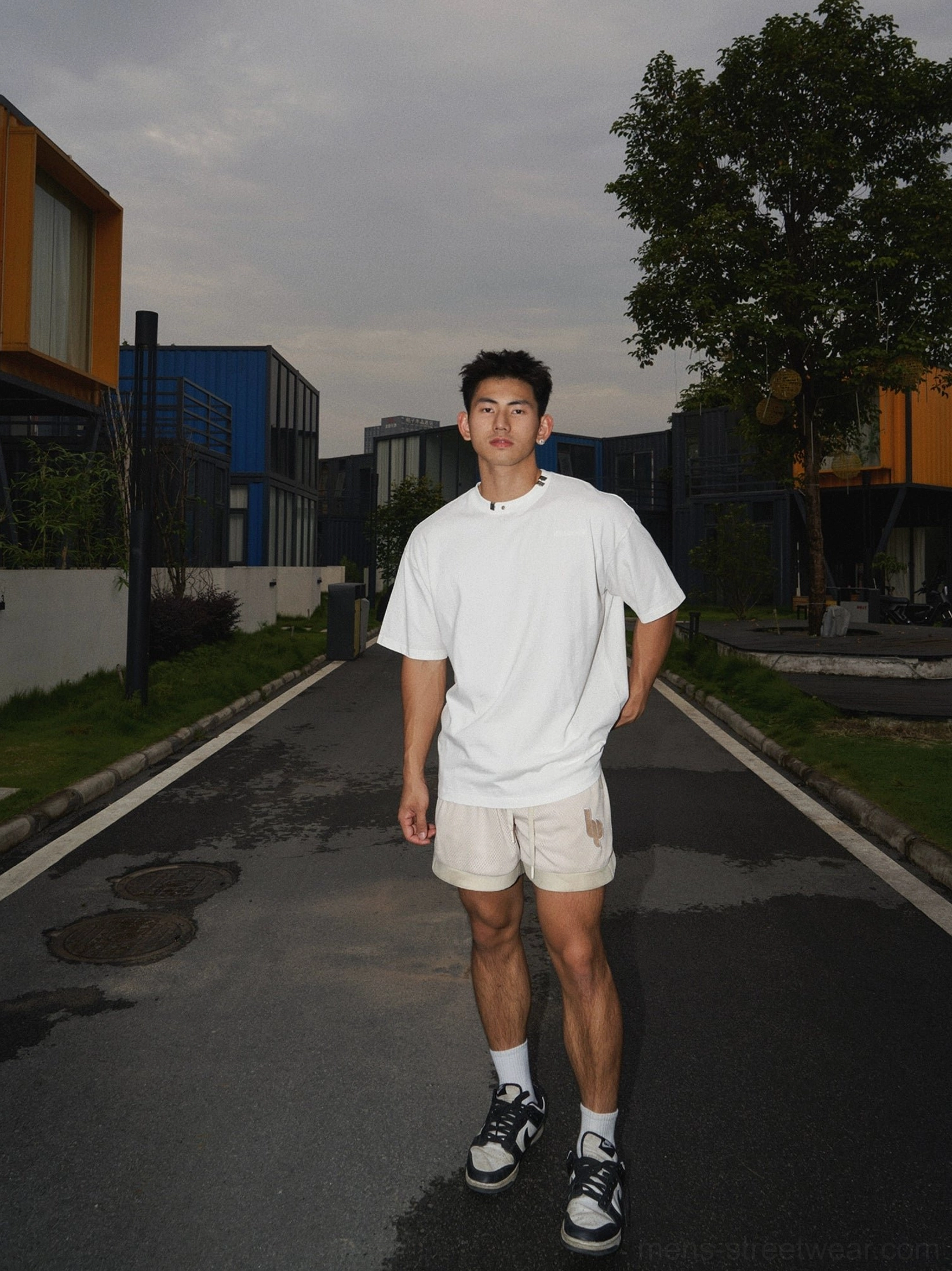 Washed cotton oversized T-shirt in vintage streetwear style with relaxed fit, faded finish, and versatile Seoul fashion aesthetic