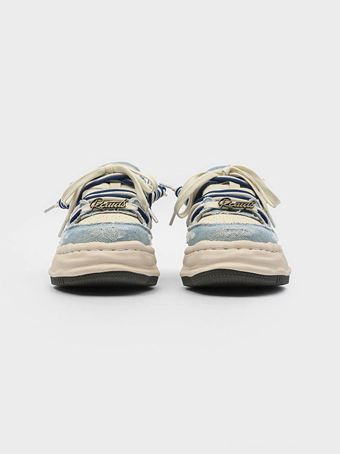 Washed denim dual-lace chunky streetwear sneakers with sculpted off-white sole and low-top street silhouette