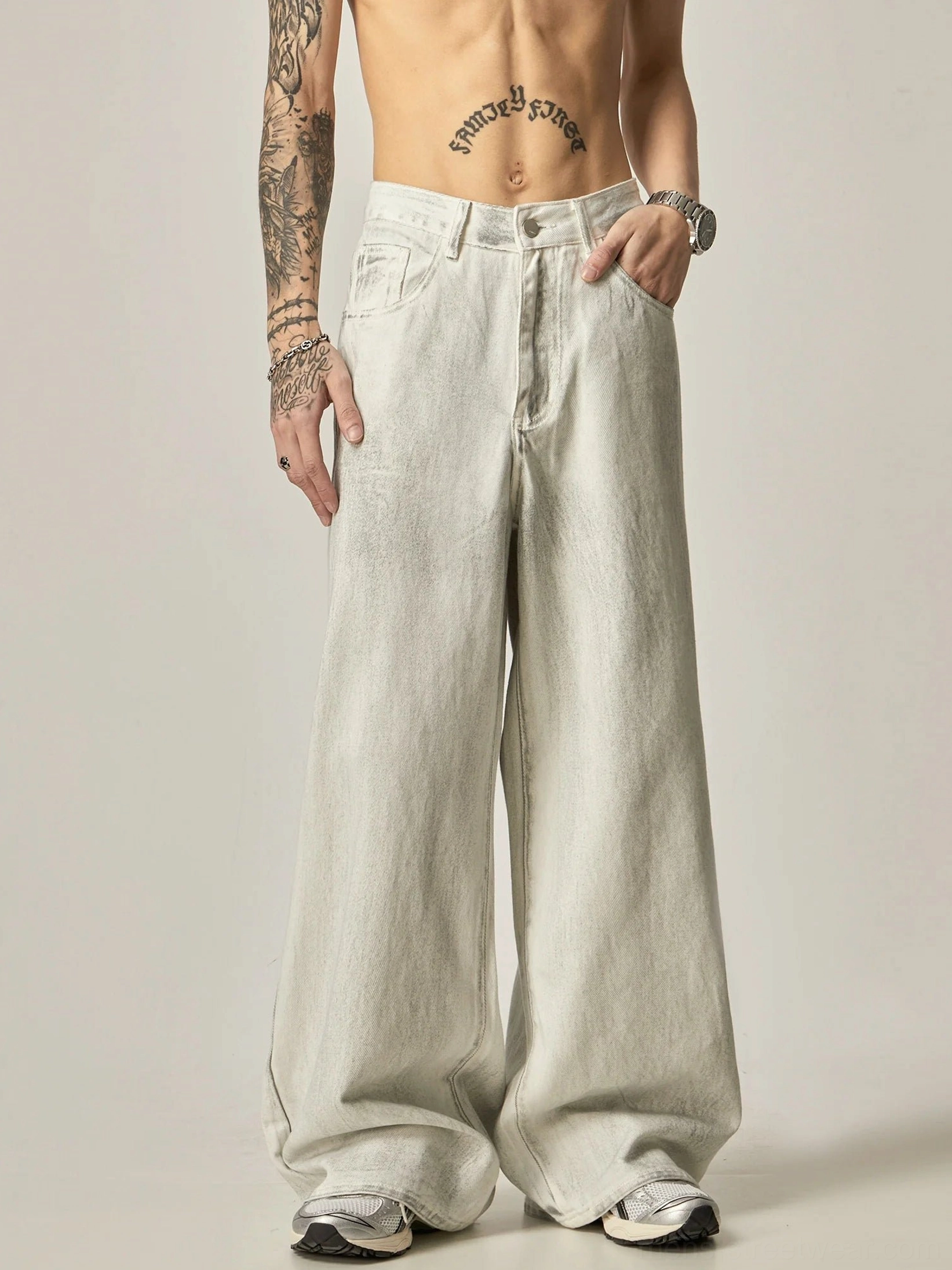 Front view of washed ecru wide-leg jeans with relaxed Korean streetwear fit and classic five-pocket denim construction