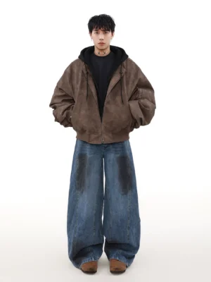 Brown oversized faux suede moto bomber jacket styled with baggy blue jeans in a vintage streetwear outfit