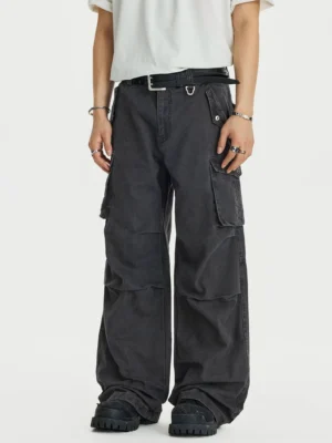Gray wide leg cargo pants front view showing button fly thigh flap pockets and faded washed finish
