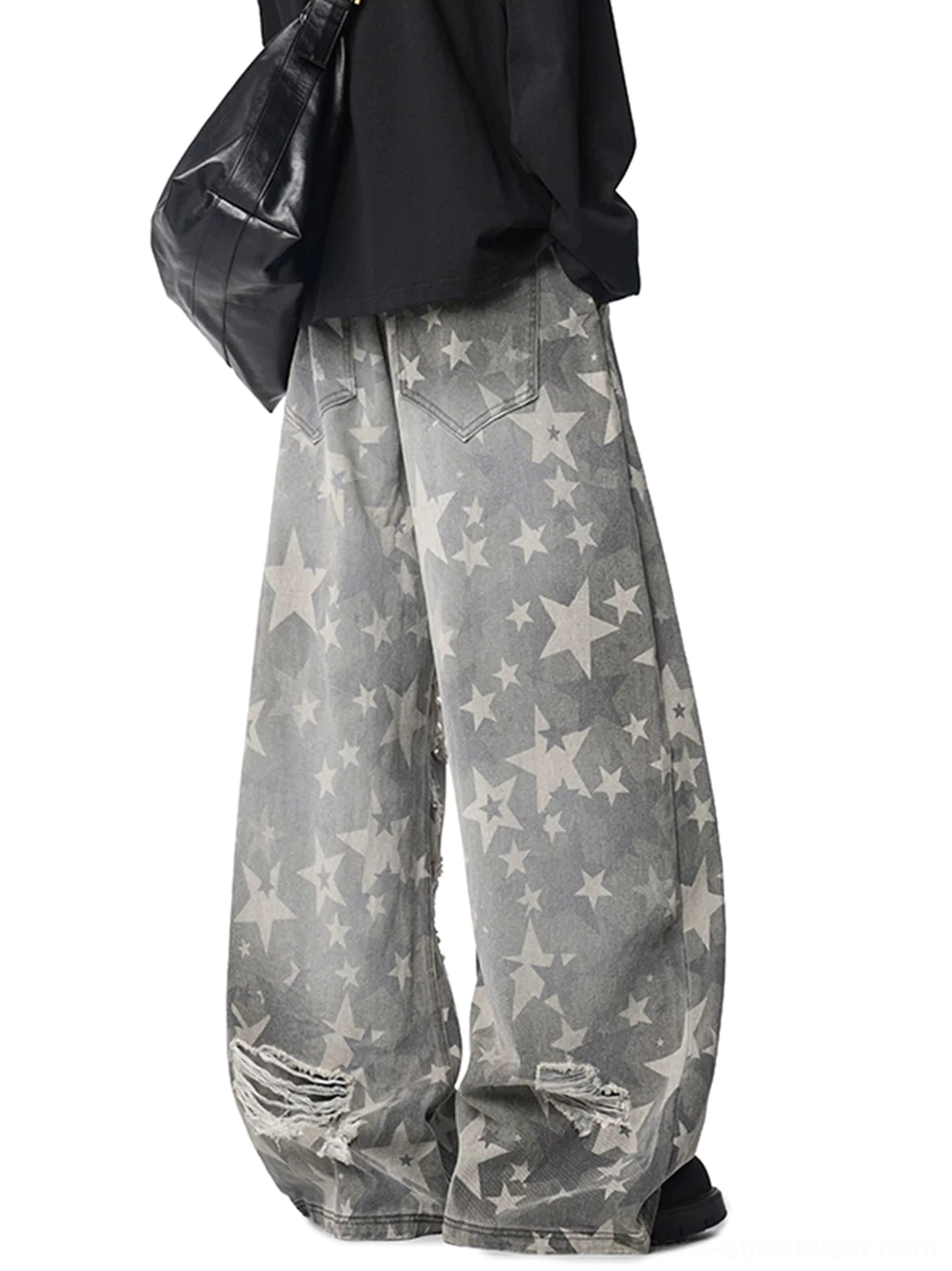 Washed grey all-over star print wide leg jeans back three quarter view with relaxed baggy fit