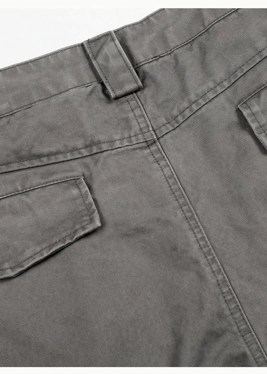 Side utility pocket and belt loop detail on washed grey barrel leg cotton twill streetwear chino pants