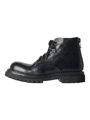 Washed horsehide rear-zip combat boot in black with round toe front laces and chunky lug sole side view