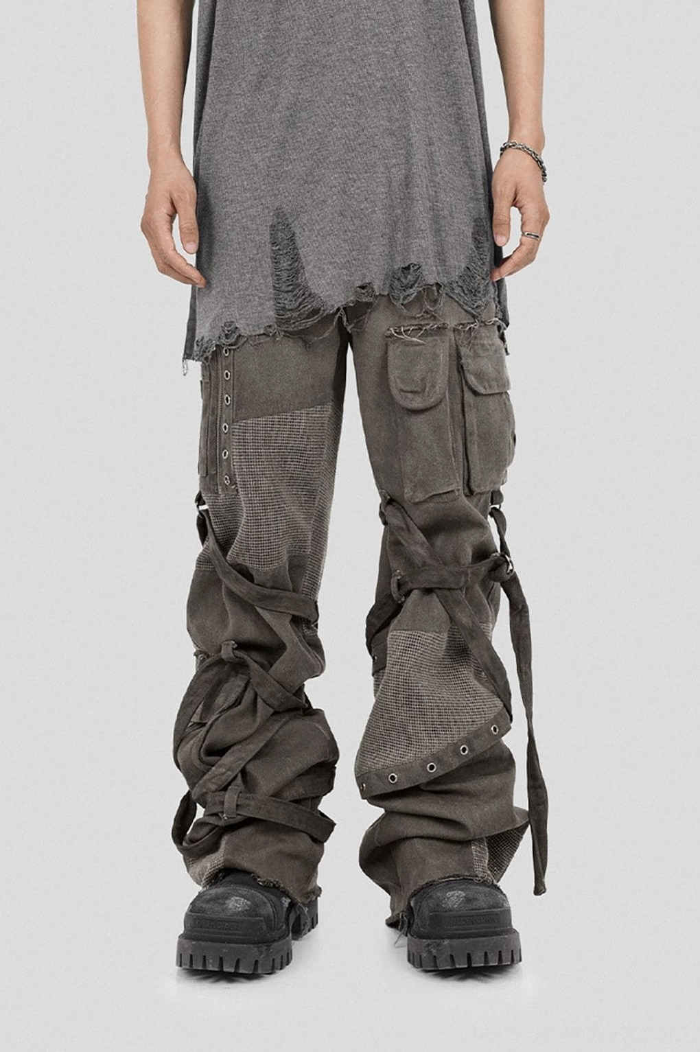 Full front alternate view of washed mesh tactical cargo pants with oversized pockets straps and wide-leg silhouette