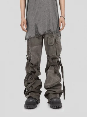Washed mesh tactical cargo pants with utility straps shown in a full front streetwear outfit with work boots
