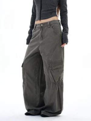 Right side view of washed olive wide-leg cargo pants showing relaxed streetwear fit and cargo pocket construction