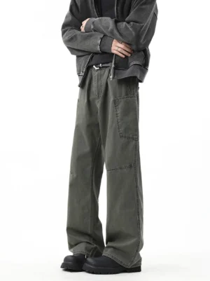Army green wide-leg utility cargo pants shown in a three-quarter front studio outfit with a cropped jacket and black shoes
