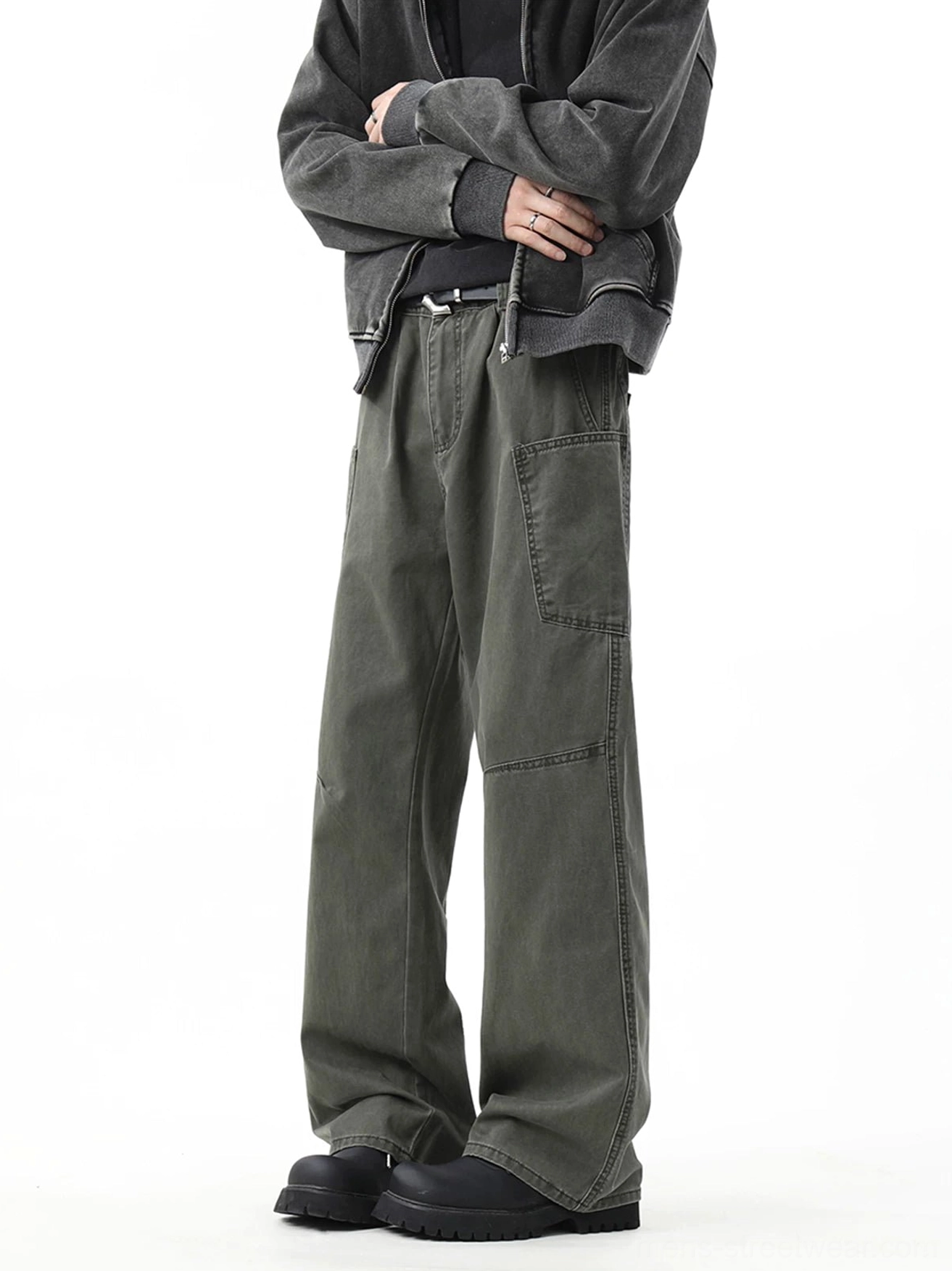 Army green wide-leg utility cargo pants shown in a three-quarter front studio outfit with a cropped jacket and black shoes