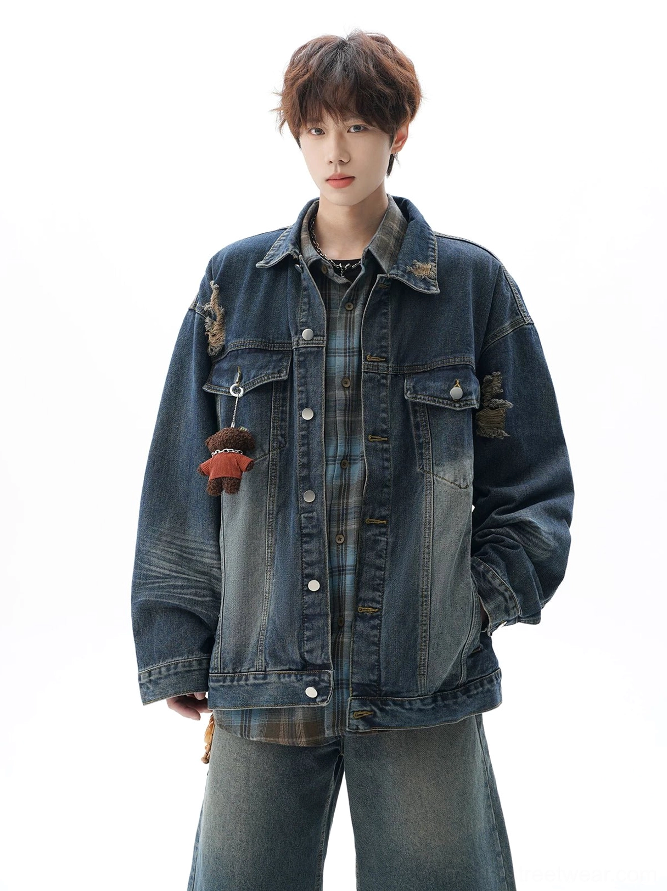 Washed black and blue vintage denim jacket with relaxed shoulders, distressed accents, button front, and Korean-inspired casual streetwear design