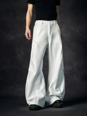 White wave contour wide-leg trousers shown from the front with sculptural curved seams and an ultra-wide Korean streetwear silhouette