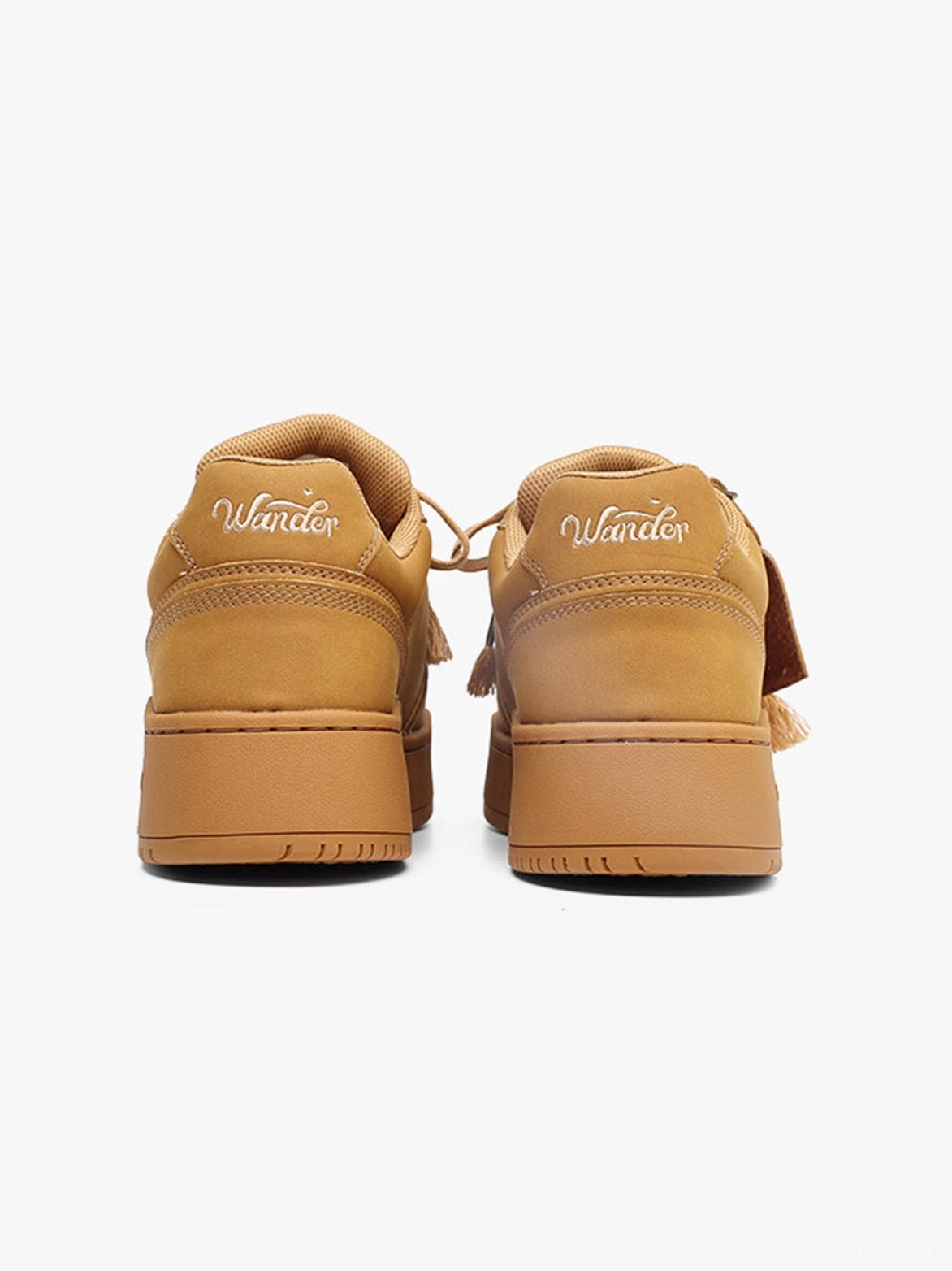 Wheat brown low-top platform sneakers styled as versatile casual footwear for denim and neutral outfits