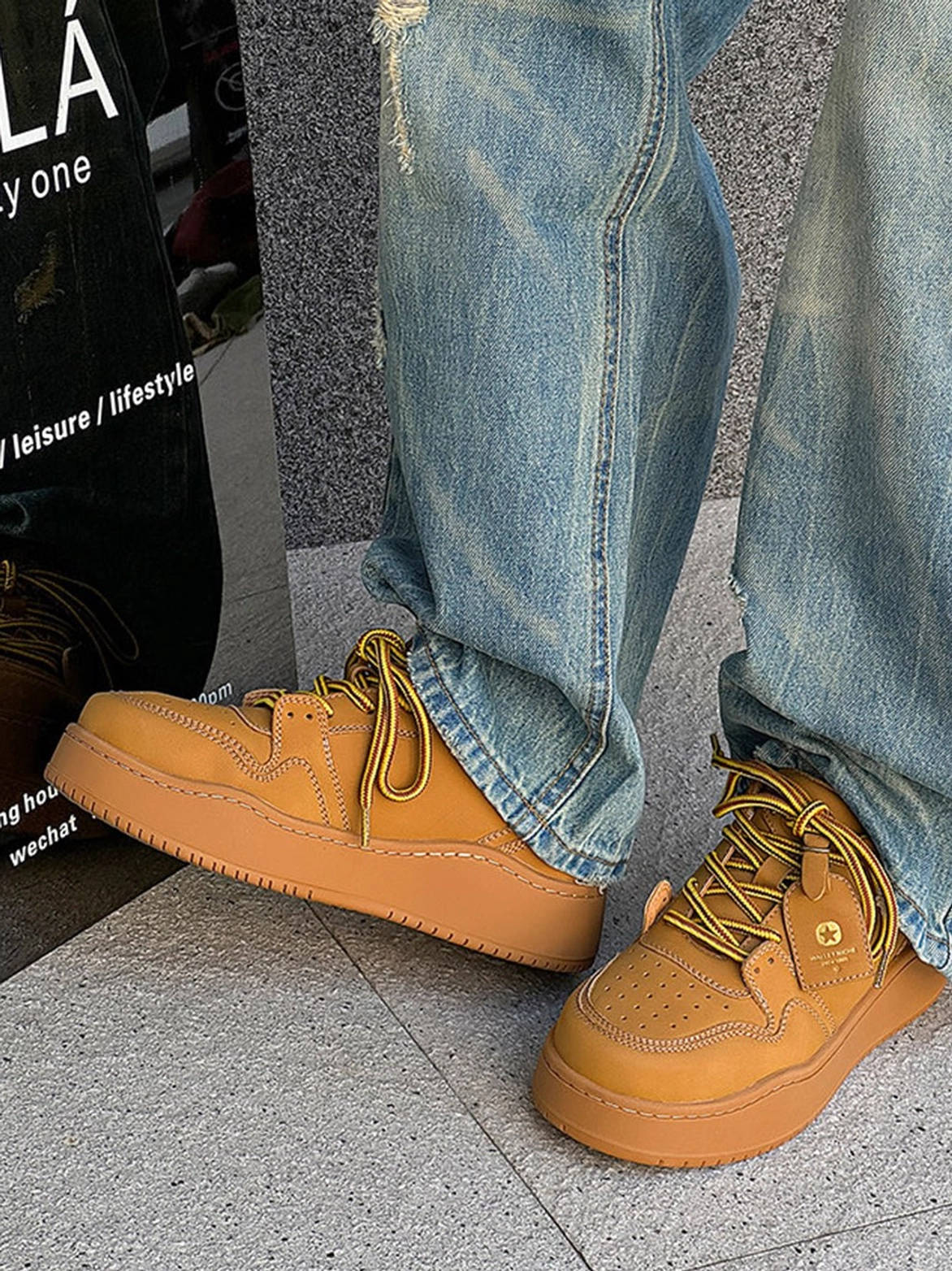 Wheat brown platform sneaker detail for modern Seoul streetwear styling with tonal upper and oversized sole