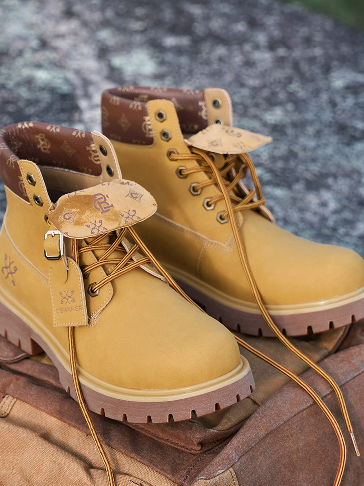 Wheat contrast-stitch lug sole work boots with rugged lace-up ankle silhouette for modern streetwear and workwear outfits