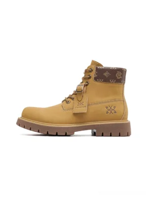 Wheat contrast-stitch lug sole work boots shown in a left side three-quarter product view with lace-up ankle design, padded collar, embossed snowflake detail, and rugged streetwear outsole