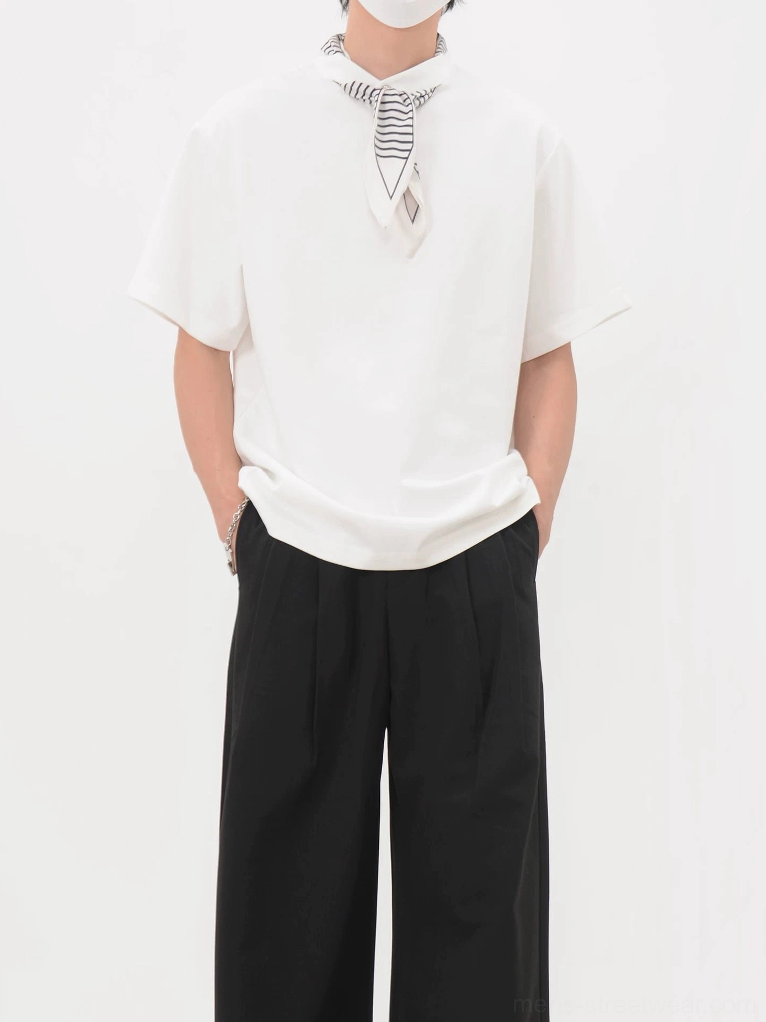 White bandana collar polo tee with striped neckerchief shown from a front three-quarter view in minimalist Asian streetwear style