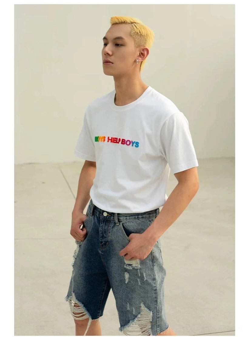 White Boys Help Boys graphic crewneck T-shirt with rainbow gradient chest lettering styled with ripped denim shorts