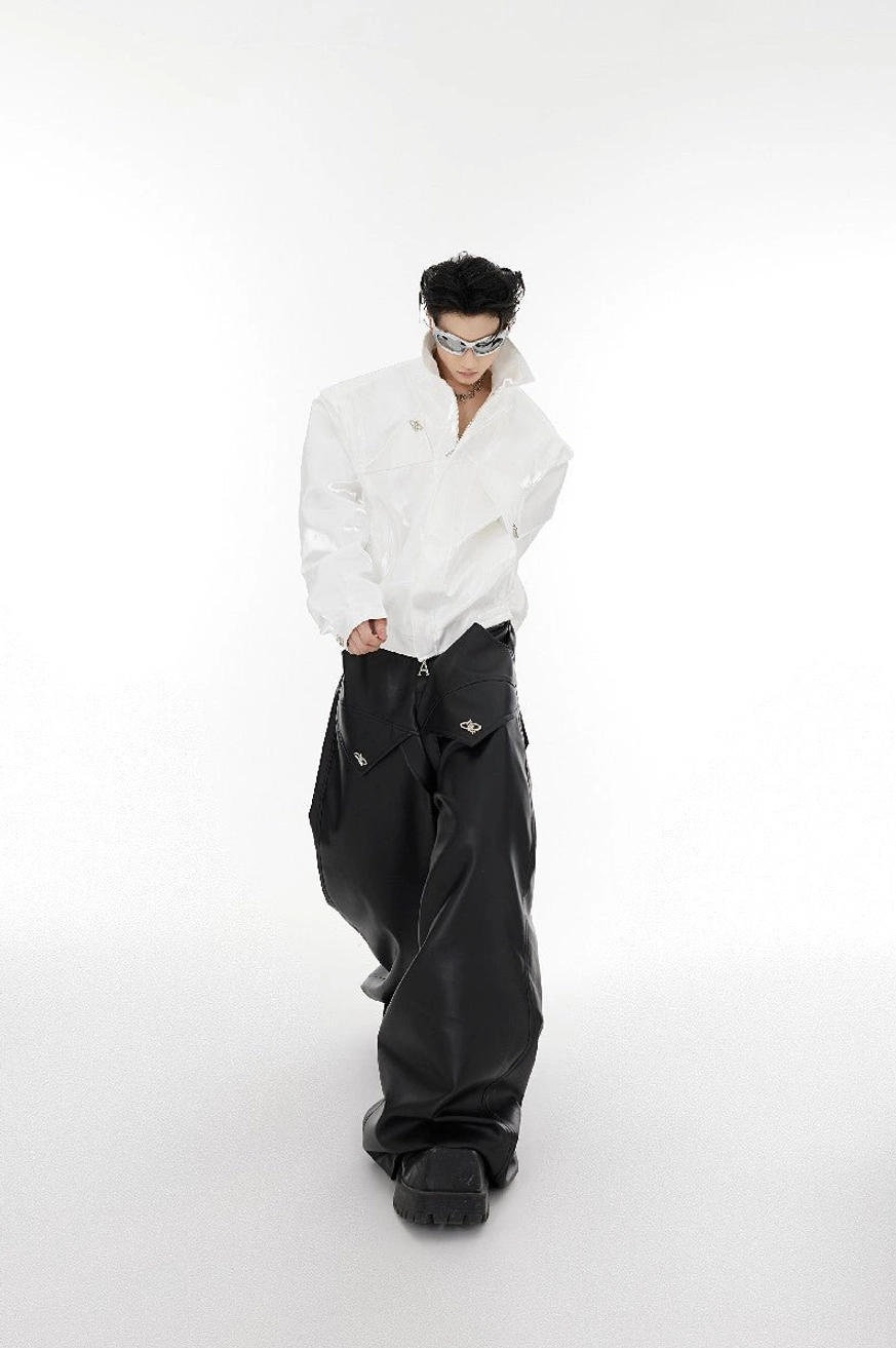 White cropped vegan leather padded shoulder streetwear jacket full body outfit styled with black wide leg cargo pants