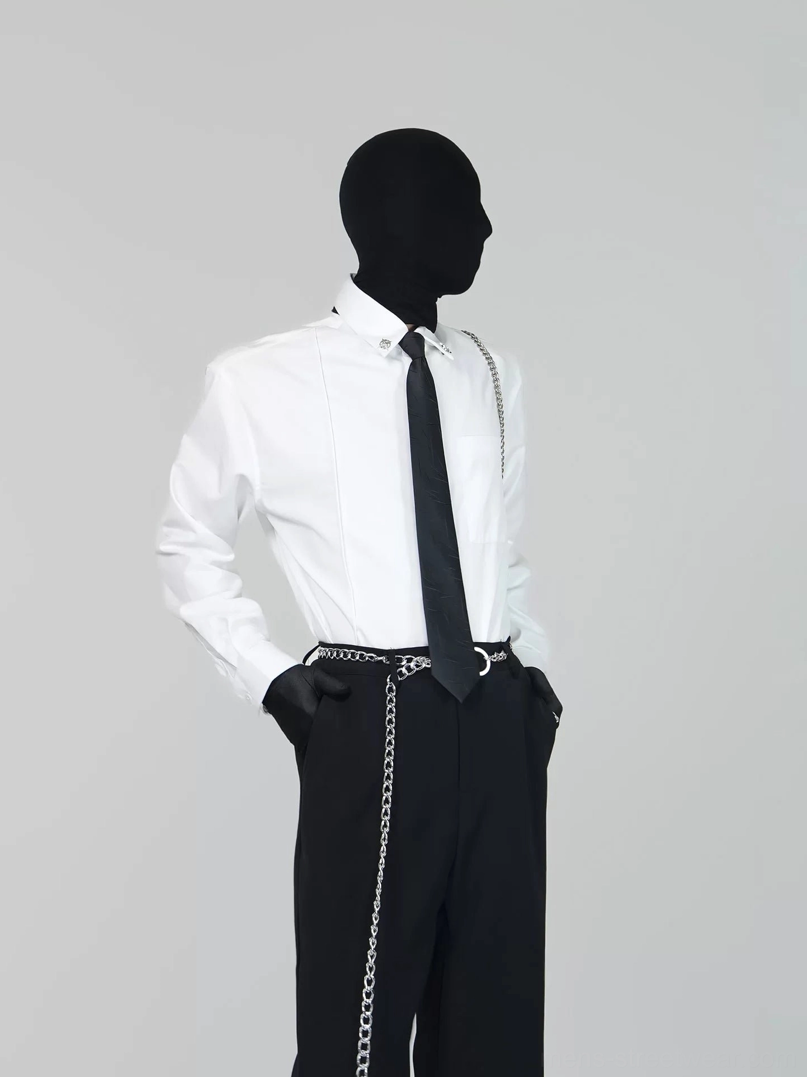 White formal dress shirt and black tie set in side view styled with wide-leg trousers and silver waist chain Korean fashion outfit