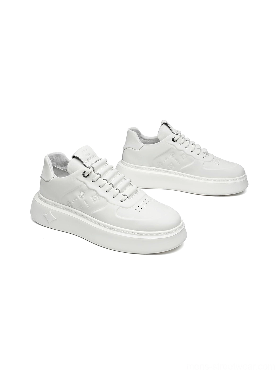 Low angle side view of white embossed monogram chunky platform sneakers with thick sculpted rubber sole
