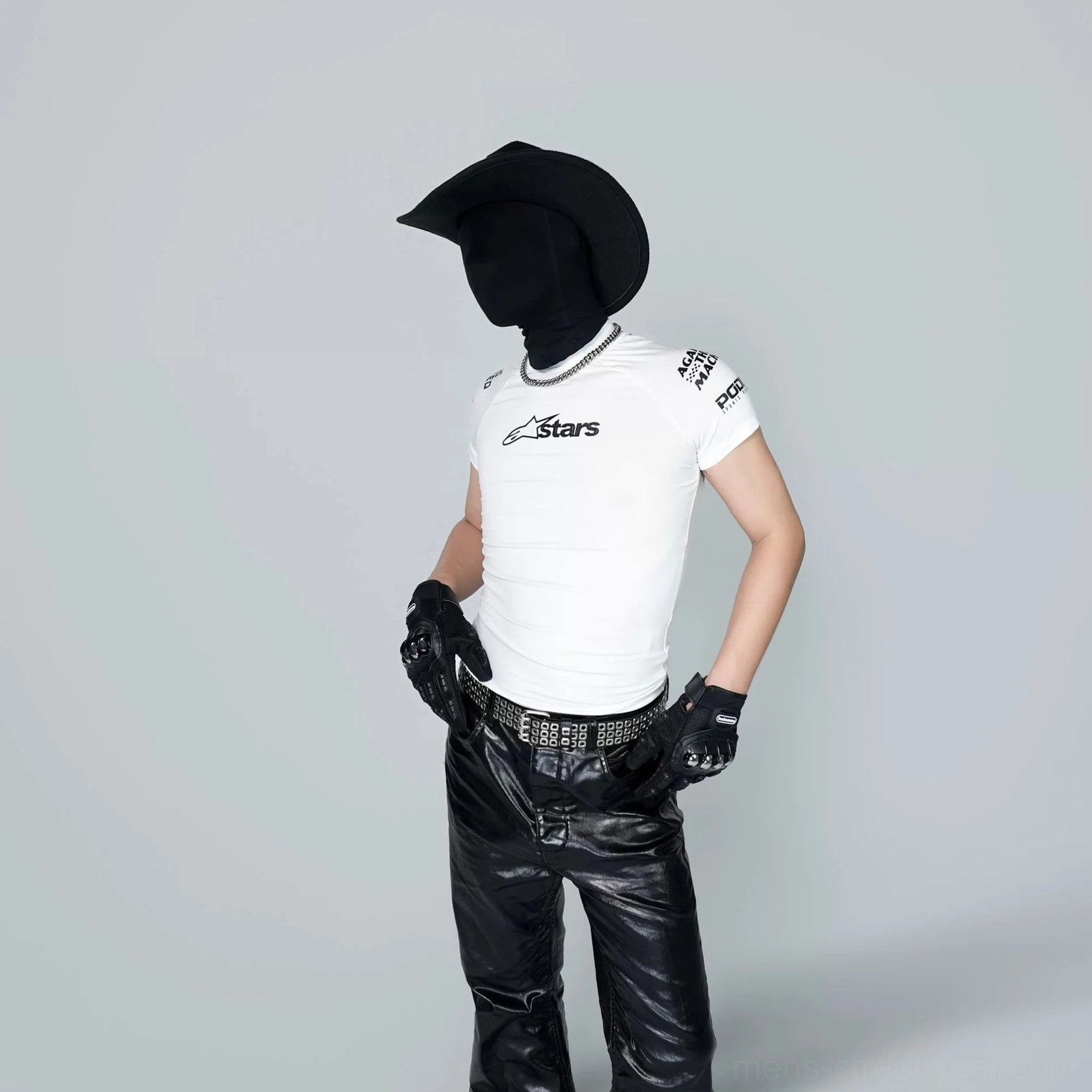White fitted racing graphic tee shown from a three-quarter side view with chest graphic and leather styling